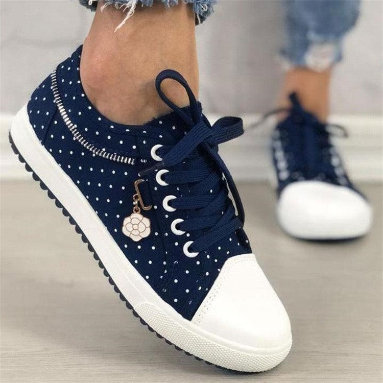 Mesh students solid color hollow casual flat canvas shoes.